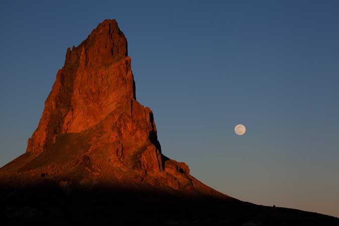 Moonrise at Agathla Peak in the high desert on the Navajo Nation in northern Arizona (south of Monument Valley)