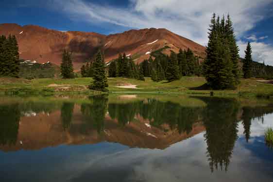 Cinnamon Mountain (12,2293 ft.) looms above Paradise Divide on the Gunnison National Forest in the Colorado Rocky Mts.