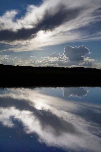 Reflections of clouds at sunset at Lower Lake Mary, northern Arizona