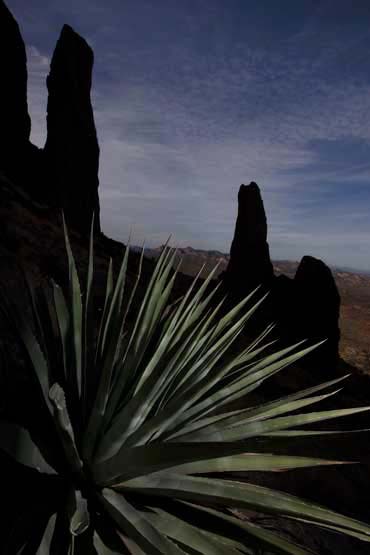 The Superstition Mts., Arizona. The spire at right is the Praying Hands rock formation.